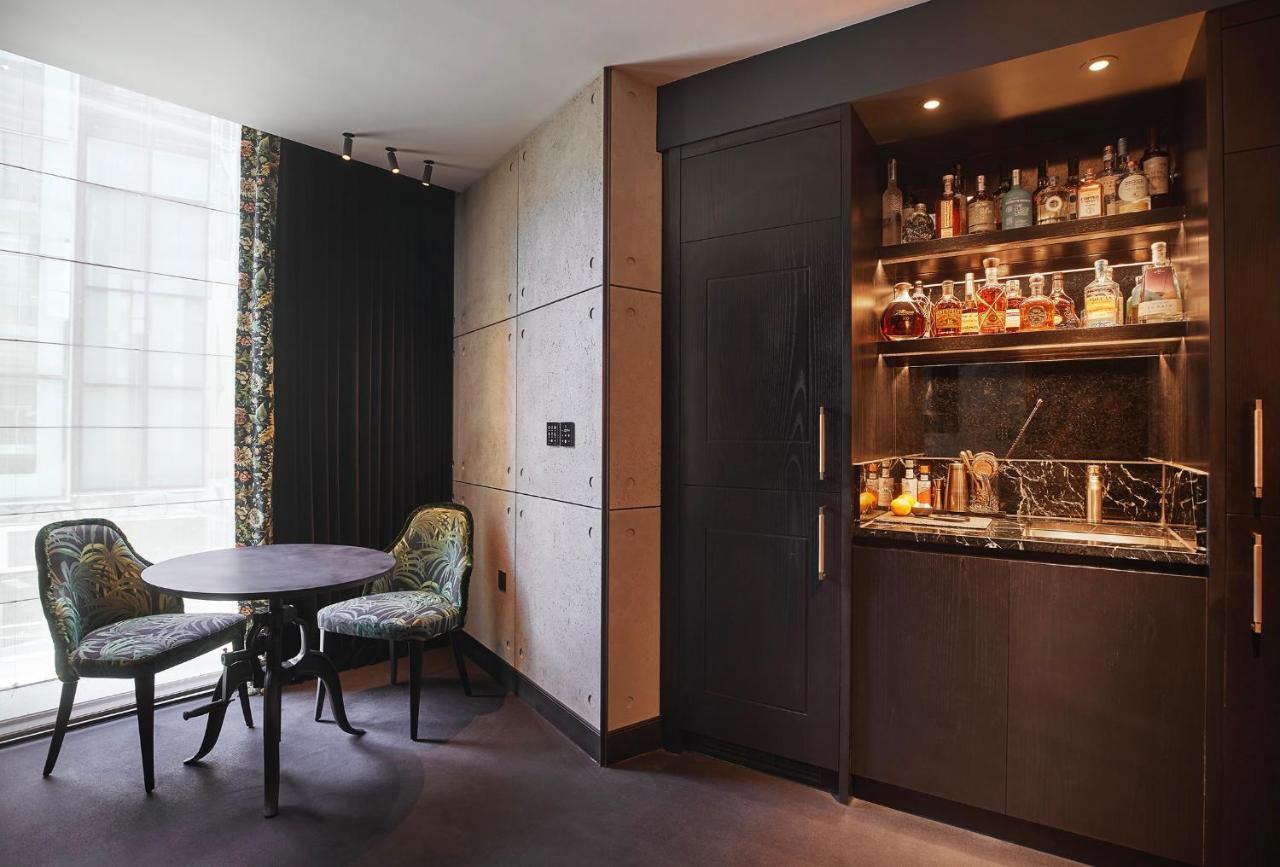 Chateau Denmark London Exterior photo A wet bar in a hotel room